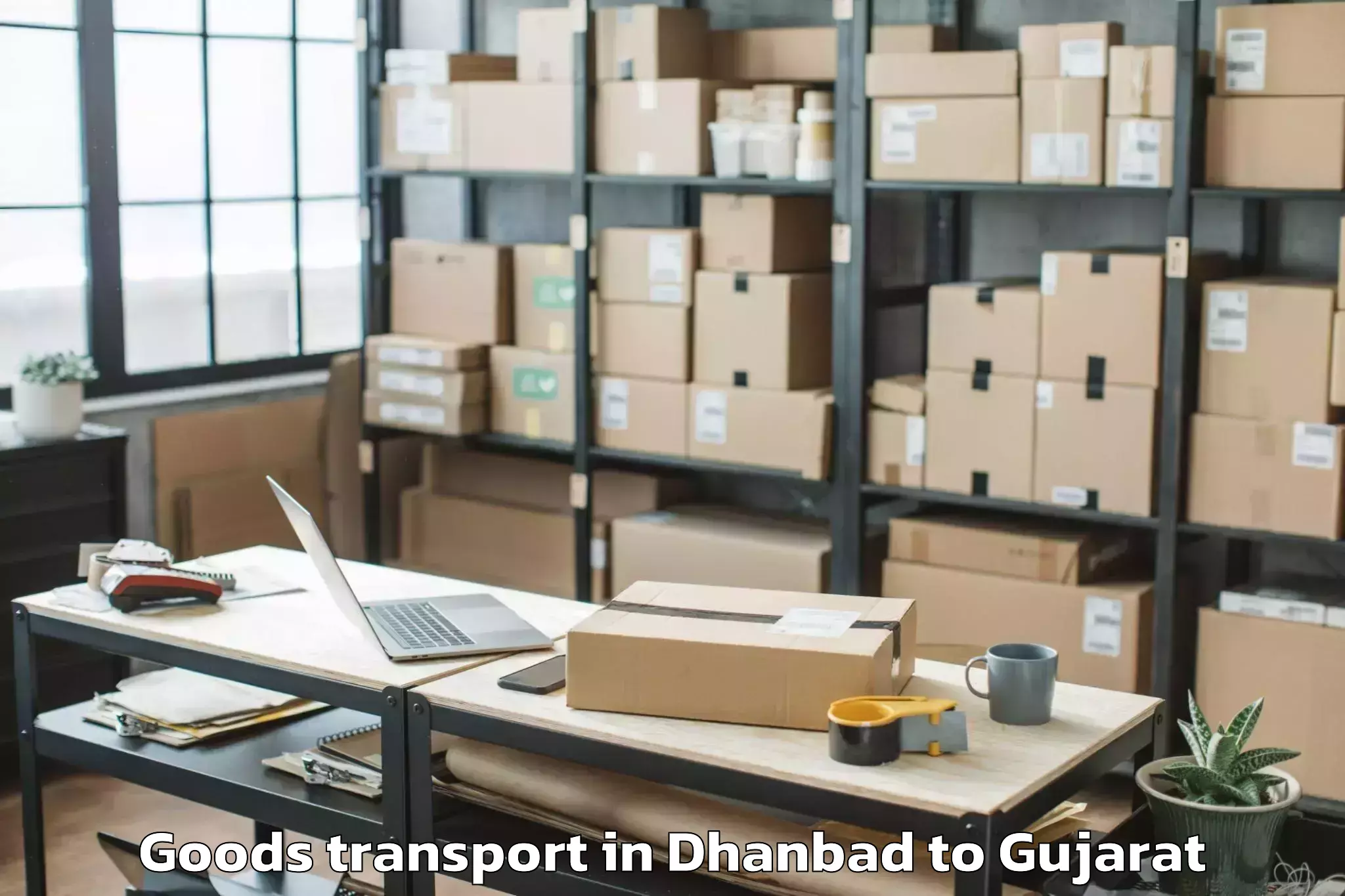 Book Dhanbad to Ganpat University Mehsana Goods Transport